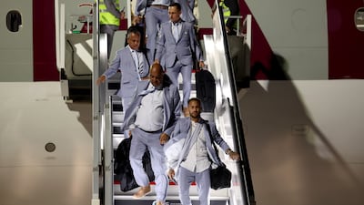 Neymar and the Brazil squad and staff disembark from an aircraft at Hamad International Airport. Getty