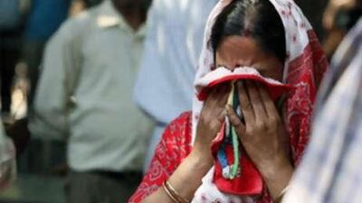 An Indian woman cries after seeing the body of a relative killed in a series of coordinated bomb attacks in New Delhi, on Sept 13 2008.