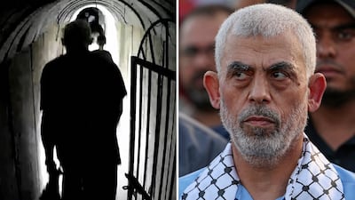 An image grab from a handout video released by the Israeli army shows what they say is Hamas's chief in Gaza, Yahya Sinwar, walking in a tunnel, in the Gaza Strip. AFP