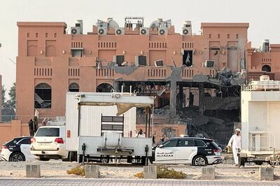 Qatari officials at the site of an Israeli attack on Hamas leaders in Doha on September 9, 2025. Reuters