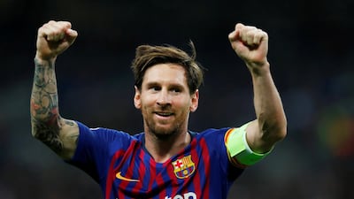 Barcelona's Lionel Messi celebrates scoring their third goal. Reuters