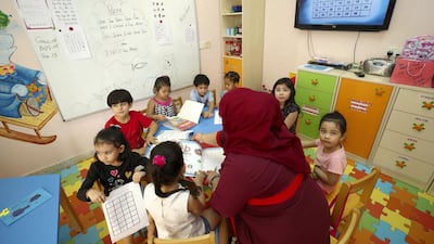 Prisoner's children learn at a class at Dubai Female Prison. Chris Whiteoak/The National