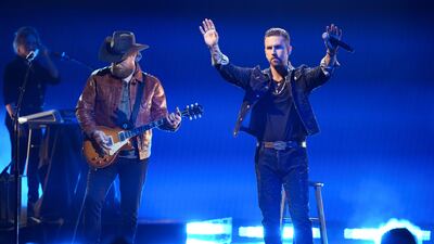 Brothers Osborne performs on stage. Reuters
