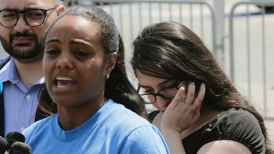 Rama Issa, right, executive director of New York’s Arab American coalition, gets teary-eyed during a press conference with Murad Awawdeh, right, of the New York immigration coalition, and Yaritza Mendez, centre, citywide outreach coordinator of Make the Road, regarding tighter restrictions on travel to the the US from six mostly Muslim nations, on June 29, 2017 at John F Kennedy International Airport in New York. Bebeto Matthews / AP Photo