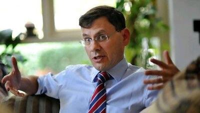 Noe van Hulst, the secretary general of the International Energy Forum, says oil producers and consumers must overcome their differences to help calm an overheated market. Delores Johnson / The National