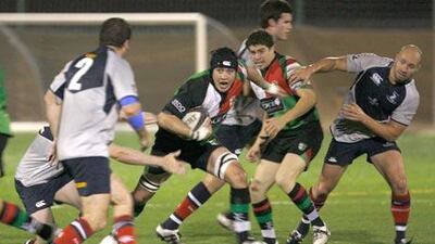 The Jebel Ali Dragons, grey kit, and the Abu Dhabi Harlequins are both in contention for the Gulf Top Six.