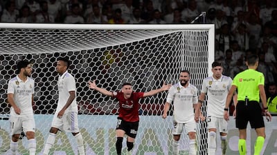 Osasuna forward Kike Barja appeals to the referee during Copa del Rey final. AFP