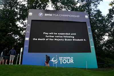 A screen displays a message that play has been suspended following the announcement of the death of Queen Elizabeth II, during day one of the BMW PGA Championship at Wentworth Golf Club, Virginia Water. PA