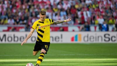 Marco Reus started in 26 Bundesliga matches for Borussia Dortmund in 2013/14, scoring 16 goals. Rolf Vennenbernd / EPA / October 18, 2014