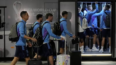 Angel Di Maria, left, and Lionel Messi, back left, arrive with teammates at Hamad International Airport in Doha. Argentina will play the first match in the World Cup against Saudi Arabia on November 22. AP Photo