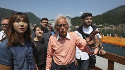 Artist Christo with a group of students from the UAE at his installation The Floating Piers on Lake Iseo in Italy. Luca Bruno / AP Photo