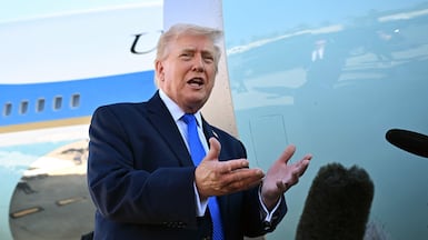WEST PALM BEACH, FLORIDA - MARCH 23: U. S. President Donald Trump speaks to reporters before boarding Air Force One at Palm Beach International Airport on March 23, 2026 in West Palm Beach, Florida. President Trump is traveling to Tennessee before returning to Washington. Roberto Schmidt / Getty Images / AFP (Photo by ROBERTO SCHMIDT / GETTY IMAGES NORTH AMERICA / Getty Images via AFP)