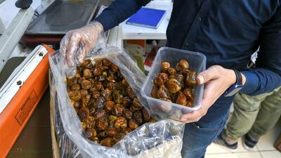 Dates on display at Bou Kharkhash in the Mina market. Khushnum Bhandari for The National