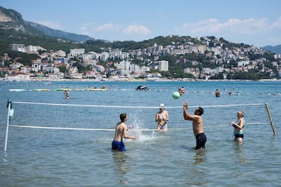 Volleyball in the sea in Montenegro. Reuters