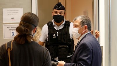 Michel Catalano, the printing house owner held hostage by the Charlie Hebdo attackers, arrives on the opening day of the trial. Reuters