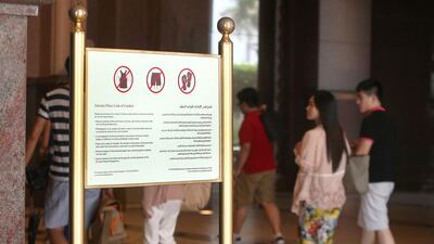 If a concerned citizen wants to take it upon his or herself to inform someone that they are not respecting the modesty codes, then they should do this assuming the person is not purposefully being disrespectful, says Fatima AL Shamsi. Fatima Al Marzooqi/ The National