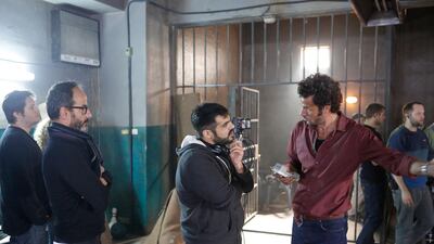 Ben Ross, producer Rami Yasin, Emirati filmmaker Majid Al Ansari and actor Ali Suliman on the set of 'Zinzana'. Courtesy Image Nation