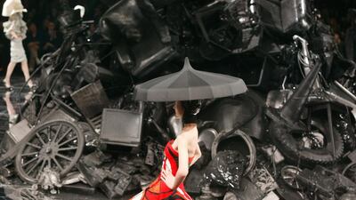 Alexander McQueen, a member of Positive Luxury, used a backdrop of repurposed props from previous collections for a runway show in 2009. Photo by Antonio de Moraes Barros Filho / WireImage / Getty Images