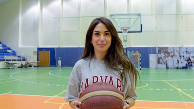 Assistant coach for the Bahraini Al-Najma Club's men basketball team Fatima Reyadh, poses for a picture ahead of a training session for the team at the club's stadium in the capital Manama on September 15, 2022. - Fatima Reyadh has overcome prejudices to become the assistant coach of Al-Najma basketball club in Bahrain's capital -- and she doesn't plan to stop there. The 33-year-old, who is also a Taekwondo black belt, aims to become head coach of the basketball team one day and then bring home the national championship. (Photo by Mazen Mahdi / AFP)
