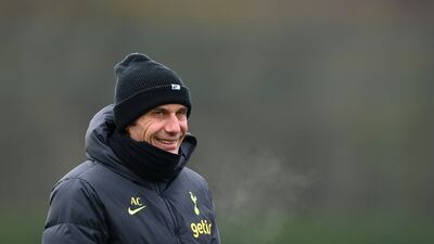 Tottenham manager Antonio Conte smiles during a training session at Tottenham Hotspur Training Centre on March 07, 2023 in Enfield, England ahead of their Champions League last-16 second leg against AC Milan. Getty Images