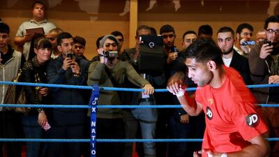Amir Khan won his last fight against Luis Collazo in May, his third win in a row since losing to Danny Garcia in July 2012. Scott Heavey / Getty Images