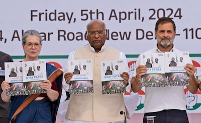 Indian National Congress leaders, from left, Sonia Gandhi, Mallikarjun Kharge and Rahul Gandhi, at the launch of their election manifesto. AP