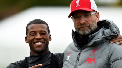 Liverpool manager Jurgen Klopp with Georginio Wijnaldum. Getty