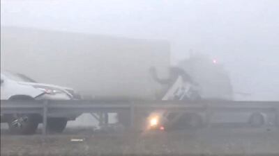 Twenty-two people were injured when dozens of vehicles collided in heavy fog outside Abu Dhabi city.