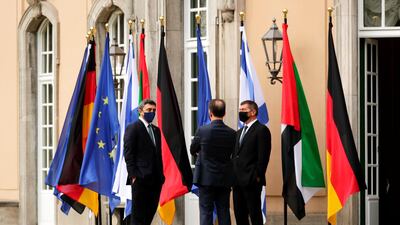 UAE Foreign Minister Sheikh Abdullah bin Zayed, his Israeli counterpart Gabi Ashkenazi and German Foreign Minister Heiko Maas before their historic meeting at Villa Borsig in Berlin, Germany. AFP
