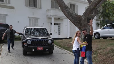 Leopoldo Lopez and his wife Lilian Tintori outside the Spanish ambassador's residence in Caracas, where they have taken refuge after a failed uprising launched on April 30, 2019. EPA