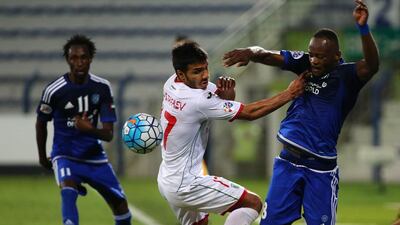 Jires Kembo Ekoko, right, of Al Nasr, in action against Salim Mustafayev of Lokomotiv club during their Asian Champions League Group A match at the Rashid Al Maktoum Stadium in Dubai on April 20, 2016. Marwan Naamani / AFP