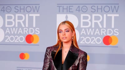 L Devine arrives at the Brit Awards 2020 at The O2 Arena on Tuesday, February 18, 2020 in London, England. AFP