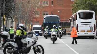 Catalan regional police escort the Barcelona team bus ahead of the el clasico clash against Real Madrid on Wednesday. AFP