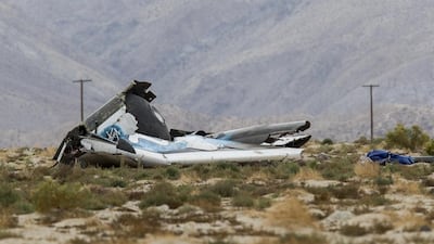 Wreckage lies near the site where a Virgin Galactic space tourism rocket, SpaceShipTwo, exploded and crashed in Mojave, California, on Friday. Ringo HW Chiu / AP Photo