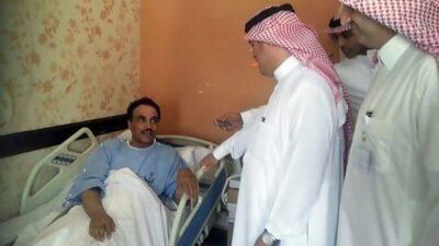 A Saudi health ministry official visits a patient who contracted a new Sars-like coronavirus at a hospital in Al Ahsaa, eastern Saudi Arabia.