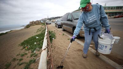 Personal protective equipment that is thrown away on beaches and roads is becoming a problem. Getty Images / AFP