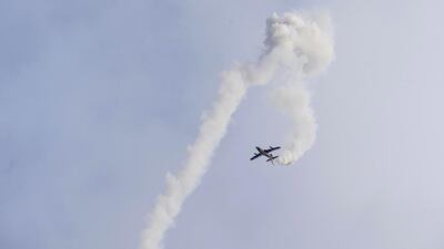 The Al Fursan aerobatics team of the UAE Air Force show off their skills at The Union Fortress live military demonstration on the Corniche in Abu Dhabi. Antonie Robertson / The National
