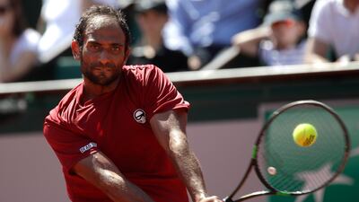 Mohamed Safwat, pictured during the 2018 French Open, has now qualified for two grand slam main draws. Alessandra Tarantino / AP Photo