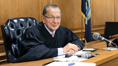 Judge Frank Caprio sits on the bench in Providence, Rhode Island. AP