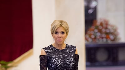 Brigitte, wearing a lace Louis Vuitton gown, paired with Louis Vuitton heels and a Roger Vivier clutch, visits New Delhi, India, on March 10, 2018. AFP