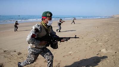 Iranian soldiers during a military exercise in the Gulf, near the strategic strait of Hormuz in southern Iran during a three-day exercise. AFP, HO via Iranian Army website