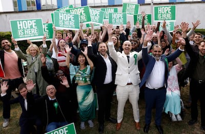 Green Party leader Zack Polanski, centre, with the party's new mayor of Lewisham, Liam Shrivastava. AFP