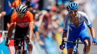 Jay Vine and Simon Yates after the final stage of the Tour Down Under. EPA