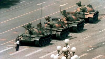 A Chinese man stood alone to block a line of tanks heading east in Beijing's Tiananmen Square on June 5, 1989. The man, calling for an end to the recent violence and bloodshed against pro-democracy demonstrators, was pulled away by bystanders, and the tanks continued on their way. This photo, taken by Jeff Widener of the Associated Press, went on to be nominated for a Pulitzer Prize and is now regarded as one of the most recognisable photographs of all time. Jeff Widener/Associated Press