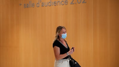 Gala Renaud, widow of Michel Renaud who was killed in Charlie Hebdo office, arrives at the courtroom on the opening day of the 2015 attacks trial. AP Photo