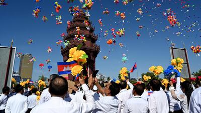 Balloons are released at the Independence Monument during a ceremony marking Cambodia's 71st Independence Day, in Phnom Penh. AFP