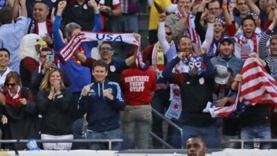 Bobby Wood of the United States gets a hug from teammate Alejandro Bedoya after scoring a goal against Costa Rica during a match in the 2016 Copa America Centenario at Soldier Field on June 7, 2016 in Chicago, Illinois. Jonathan Daniel/Getty Images/AFP
