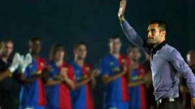 The new Barcelona coach Josep 'Pep' Guardiola waves as he is officially presented to fans at their 43th Trophy Joan Gamper friendly match against Boca Juniors in the Nou Camp two weeks ago.