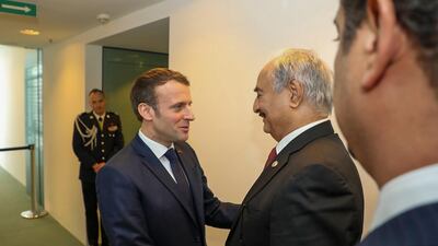 Field Marshal Khalifa Haftar's Haftar greets French President Emmanuel Macron in Berlin in January. AFP