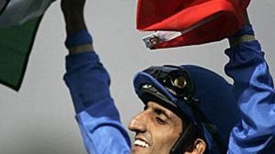 Ahmed Ajtebi celebrates after guiding Vale of York to victory at the Breeders' Cup in California.